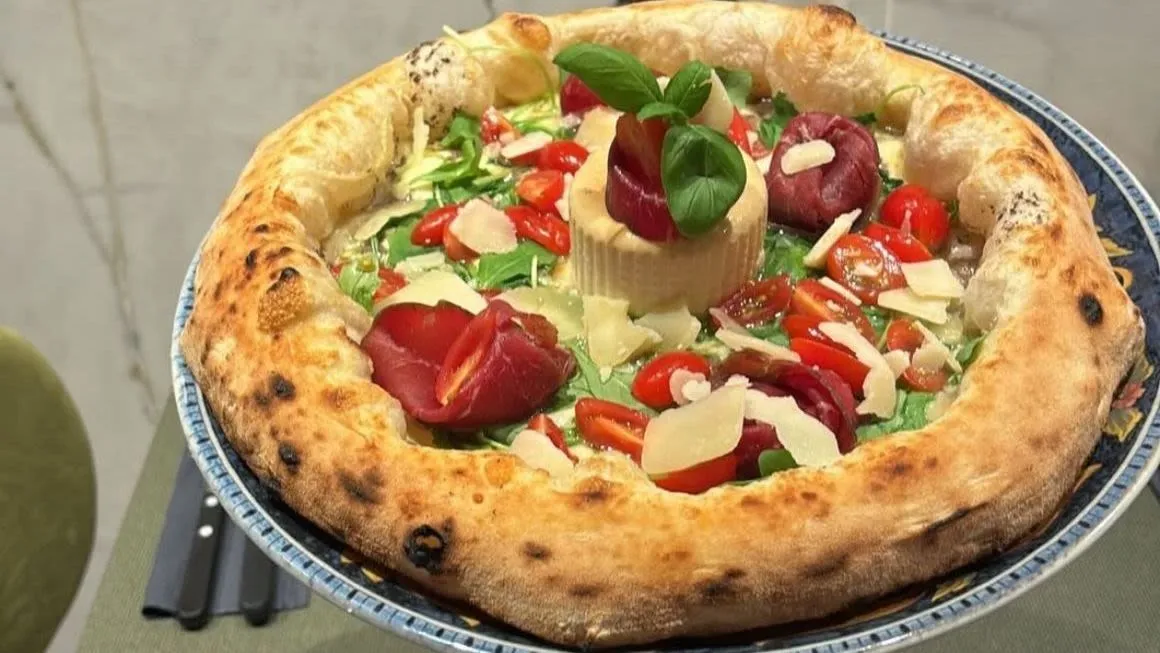 Neapolitan pizza with bresaola and burrata